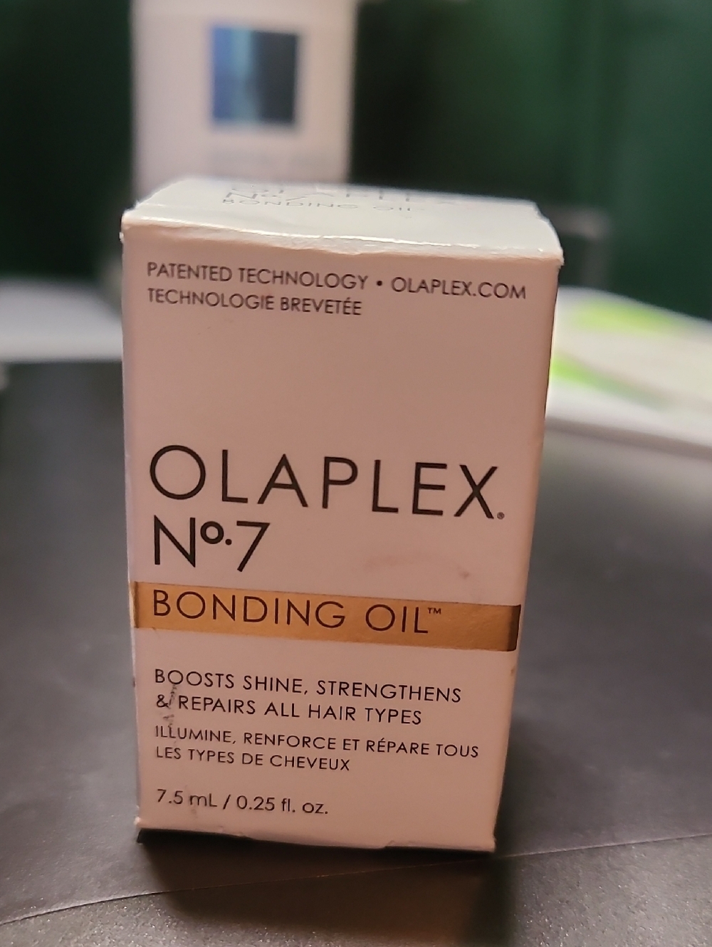 OLAPLEX No.7 Bonding Oil — White & Gold Accents